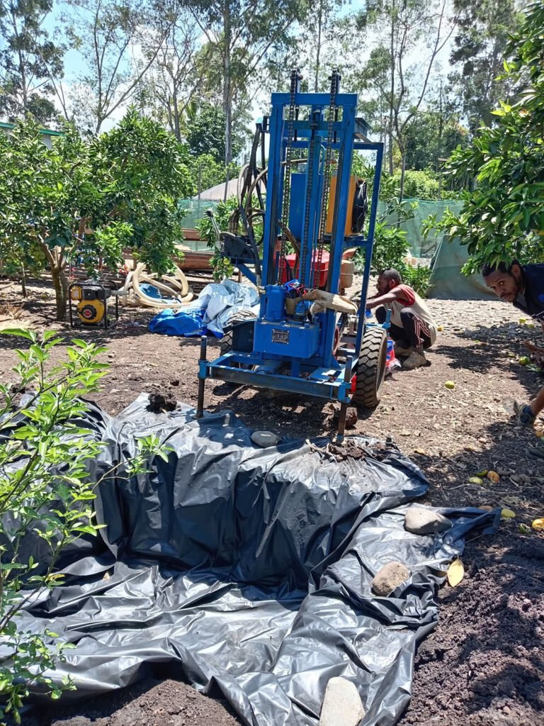 Shallow well rig set up on a prepared site